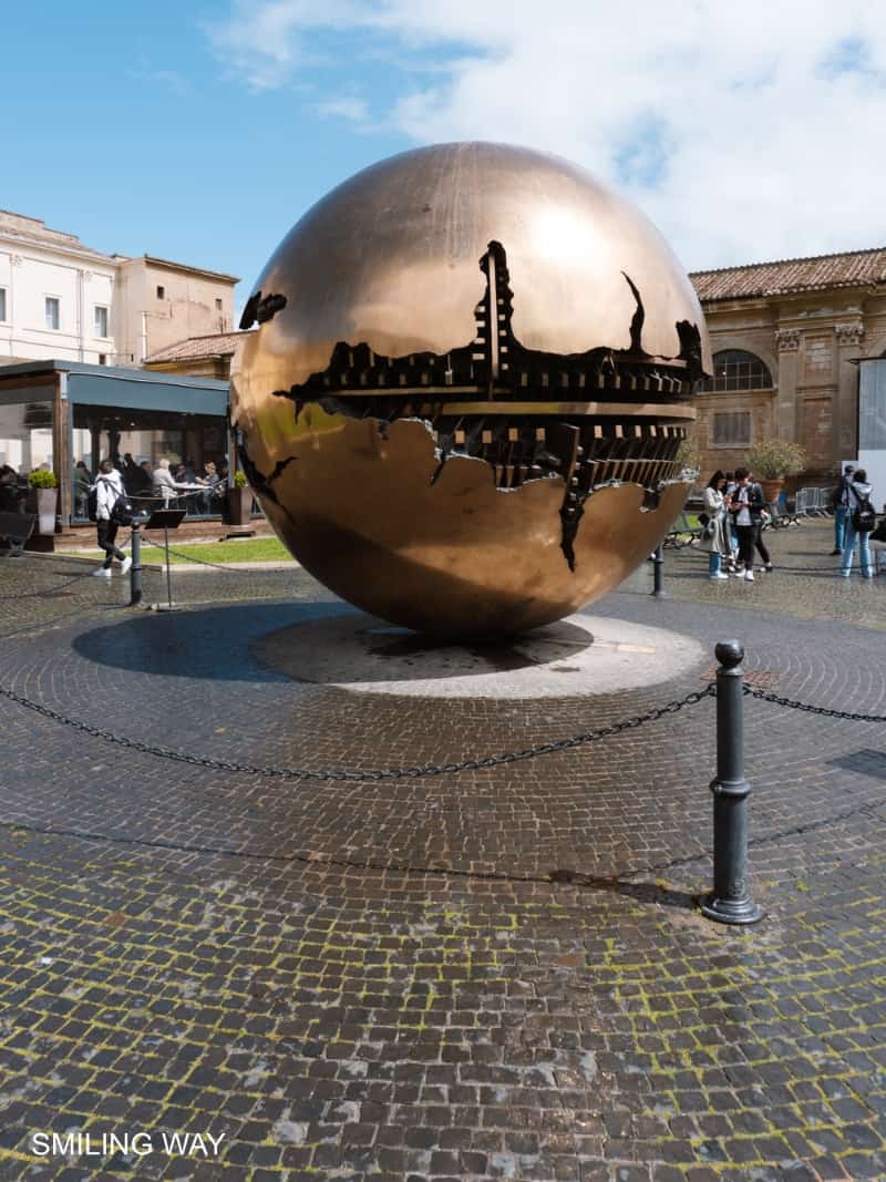 The bronze sculpture Sfera con Sfera by sculptor Arnaldo Pomodoro symbolizes the relationship of the religious world to the world at large