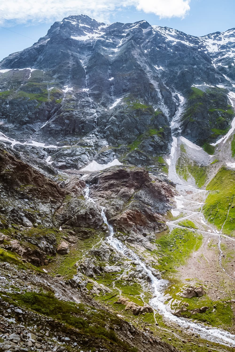 Waterfall and rocky slopes around the Braunschweiger Hütte in the Pitztal Valley in Tyrol
